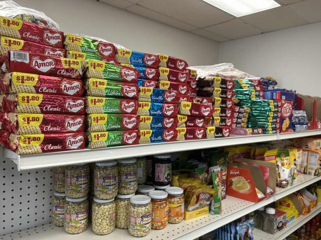 Shelves of imported cookies, snacks, and pantry favorites